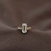 Elegant Emerald-Cut 5A White Cubic Zirconia Gold-Plated 925 Silver Ring brown background