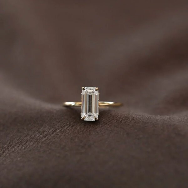 Elegant Emerald-Cut 5A White Cubic Zirconia Gold-Plated 925 Silver Ring brown background